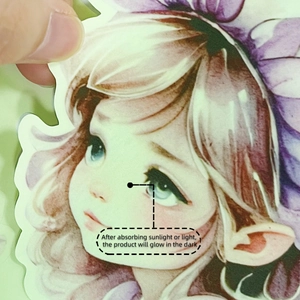 Close-up of luminous fairy flower wall sticker showing detail of anime girl and floral print