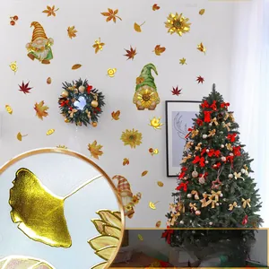 Detailed close-up of sunflower and gnome wall stickers with golden metallic texture