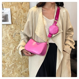 Fashionable bright pink crossbody bag set with wide strap and round coin purse for women
