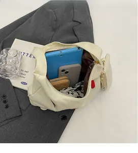 Top view of spacious canvas tote bag interior showing laptop, phone and accessories