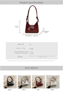 Detail view of the PU leather crescent bag featuring a stylish metal bow ornament