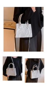 Silver PU leather handbag showing three ways to wear with its handles and shoulder strap