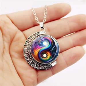 Oriental silver hollow moon necklace with rotating rainbow dragon yin yang pendant