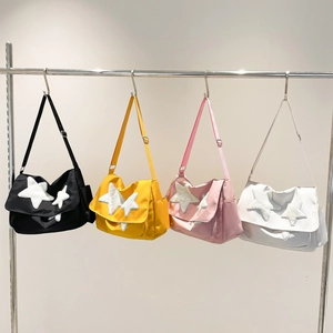 Star patch messenger bags for students in black, yellow, pink and white nylon