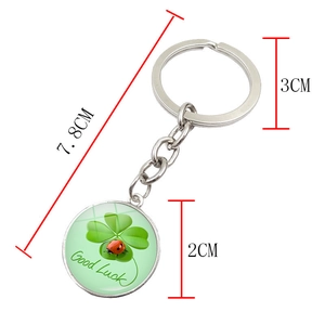 Good Luck four-leaf clover keychain with silver ring and green clover charm, 7.8cm long