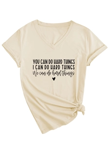 Detail of V-neck beige t-shirt featuring 'You Can Do Hard Things' text and front knot