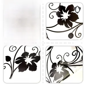 Detail of waterproof black floral vine window sticker showing front and reverse sides