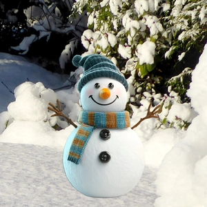 Cute PVC snowman garden stake with blue hat and scarf in a snowy winter outdoor setting