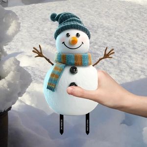 Festive snowman garden stake with blue knitted hat and striped scarf for lawn decor