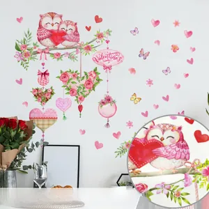Detail of Valentine's Day owl wall stickers featuring pink birds and love heart accents