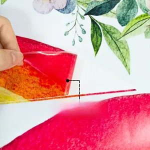 Detail showing self-adhesive backing layer of watercolor floral and leaf wall decal sticker