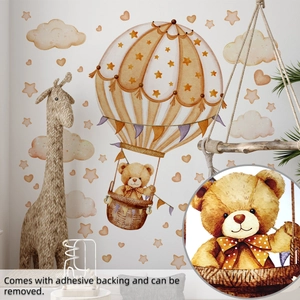 Detail of hand-painted bear in hot air balloon wall sticker with watercolor texture