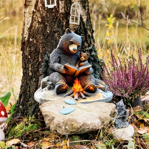 Charming resin black bear parent and cub reading by a campfire garden stake ornament