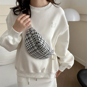 Minimalist black and white checkered tweed chest bag with silver zipper for women
