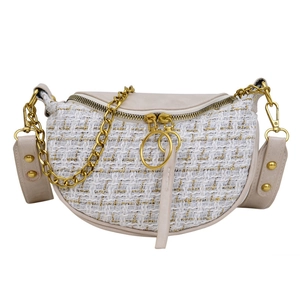 Chic tweed saddle bag with gold chain strap and ring zippers on white background