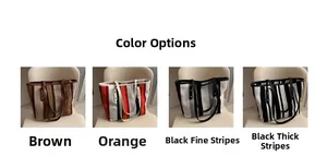 Detail view of four striped canvas tote bags in brown, orange and black patterns