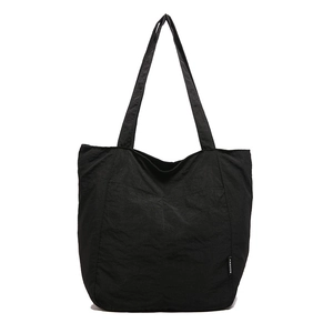 Minimalist black nylon tote bag with large capacity and durable double shoulder straps