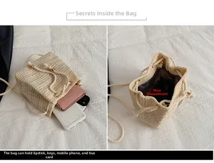 Detail of woven straw bucket bag interior capacity showing phone and wallet storage