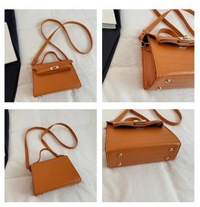 Detailed views of a brown crocodile texture crossbody bag with gold hardware and studs