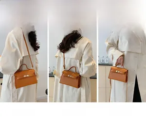 Three-way carry demonstration of caramel leather kelly bag with turn-lock and stone texture