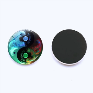 Yin Yang Tai Chi glass fridge magnets with dragon smoke pattern on white background