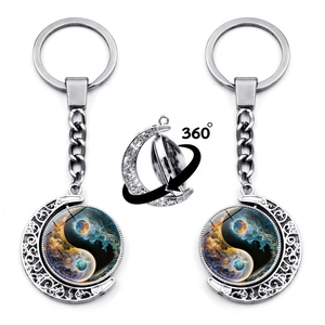 Rotating Yin Yang keychain with 360-degree moon frame and cosmic nebula pendant