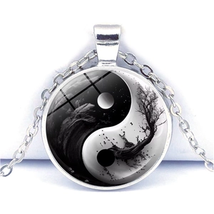 Artistic Yin Yang Tai Chi pendant necklace with silver chain and nature motifs