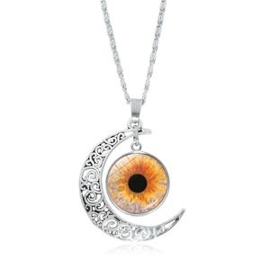 Detailed view of silver crescent moon pendant necklace with orange eye glass gemstone