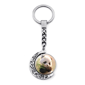 Rotating bamboo panda keychain with silver crescent moon pendant and cute animal charm