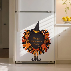 Detail view of Halloween pumpkin and witch wreath wall sticker on a white fridge surface