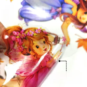 Close-up of double-sided adhesive window sticker with hand-drawn fairy and maple leaf motif