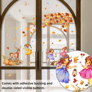 Detail of double-sided autumn window stickers featuring fairies, deer, and maple leaves