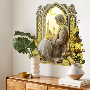Detail of Islamic wall sticker featuring a woman by a window with mosque and crescent moon