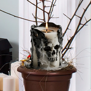 Gothic skull candle holder with black relief for Halloween garden and patio decoration