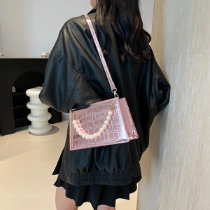 Pink crocodile pattern evening bag with pearl chain handle and leather shoulder strap