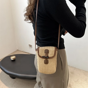 Rainbow stripe woven straw crossbody bag for women with leather trim and toggle closure