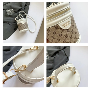 Detail view of mini bucket bag with vintage monogram fabric and golden hardware accents
