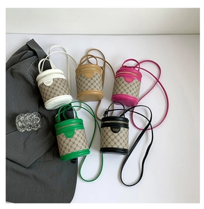 Group view of mini cylinder bucket bags in five colors with classic monogram patterns