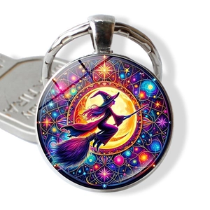 Halloween witch flying on broom metal keychain with colorful magical pattern design