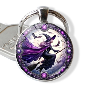 Purple Halloween witch riding broom on round glass silver keychain with key reference