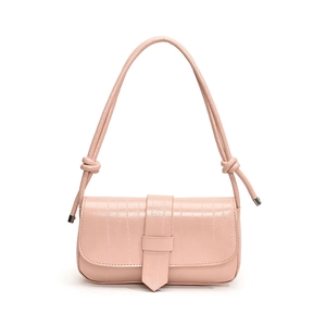 Chic light pink embossed leather shoulder bag with decorative knotted straps and buckle