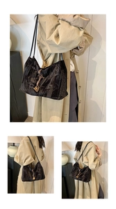 Macro view of black velvet shoulder bag showing bamboo texture and drawstring detail