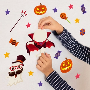 Halloween wall stickers set with ghosts, pumpkins and candy for festive indoor party decor