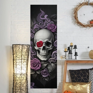 Gothic Halloween wall hanging with skull, red and purple roses on white brick wall