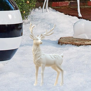 Close-up of white PVC reindeer garden stake with detailed fur texture in snow scene
