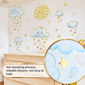 Detail showing gold hot stamping on sun, cloud, and heart stickers for kids room