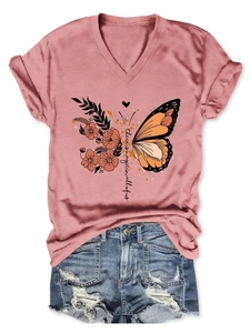 Flat lay of V-neck T-shirt in dusty rose with floral butterfly and magic quote print