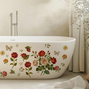 Stickers muraux roses et papillons sur une baignoire blanche dans une salle de bain chic