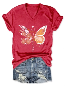 Red V-neck T-shirt with 'there is magic' butterfly floral print and denim shorts