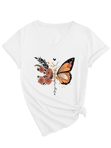 Detail of V-neck white tee with butterfly and floral art and magic-themed lettering